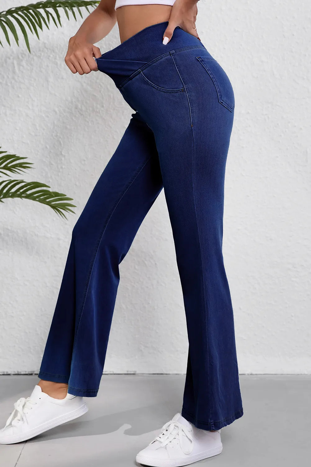 Asymmetric Waist Flare Jeans Trendsi