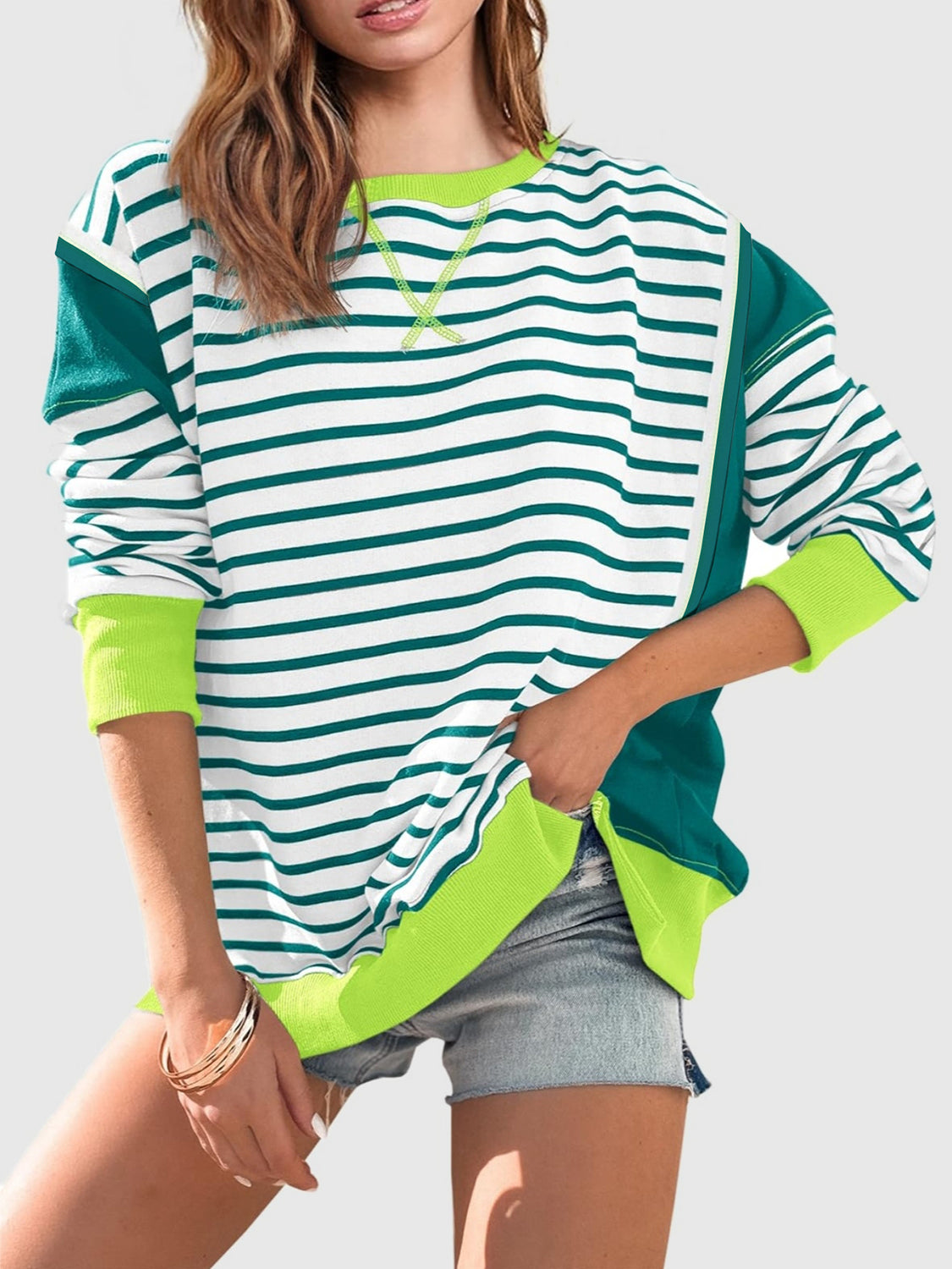 Slit Exposed Seam Striped Long Sleeve Sweatshirt Trendsi