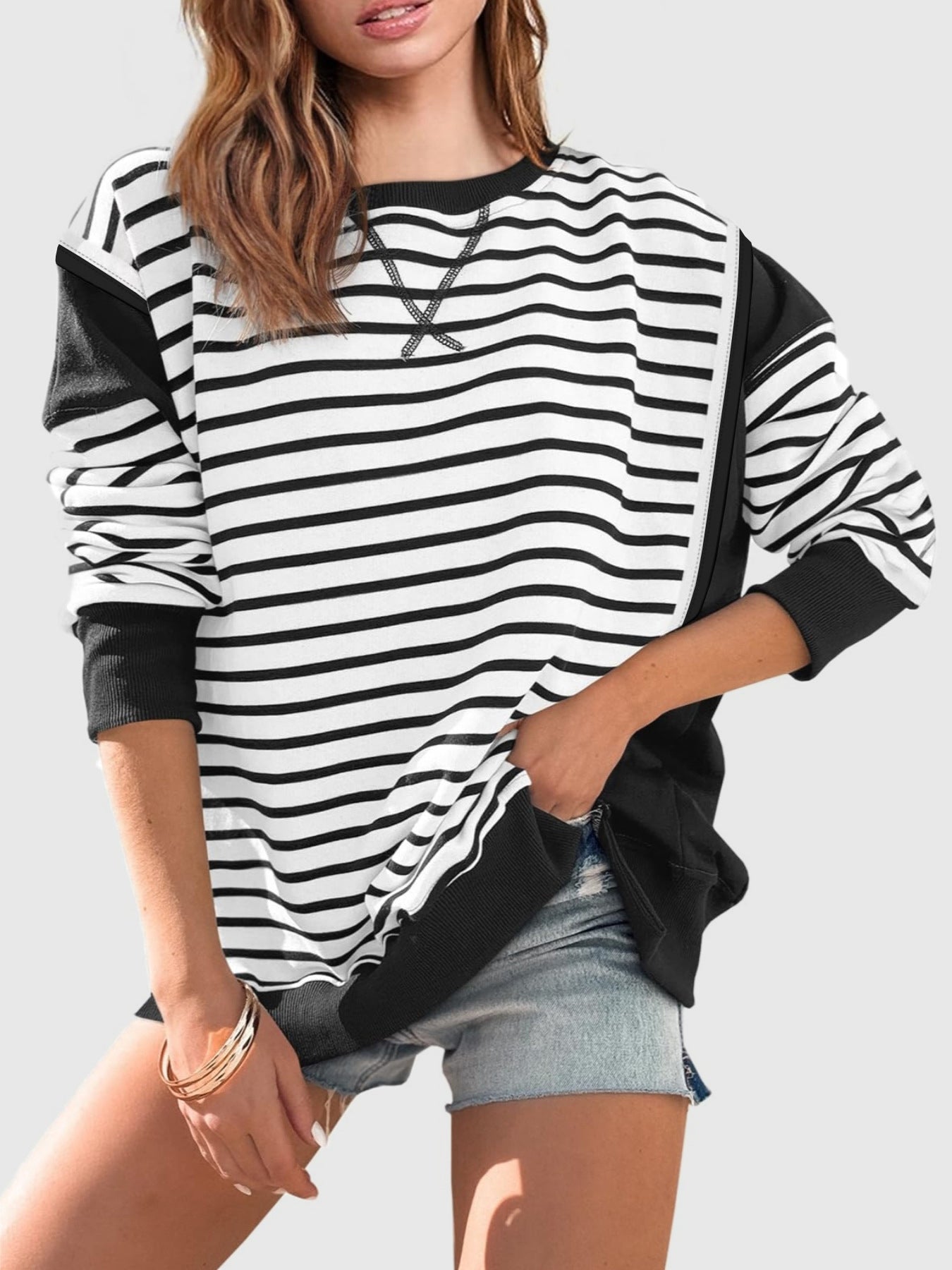 Slit Exposed Seam Striped Long Sleeve Sweatshirt Trendsi