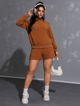 Long Sleeve Hoodie and Pocketed Shorts Set Trendsi